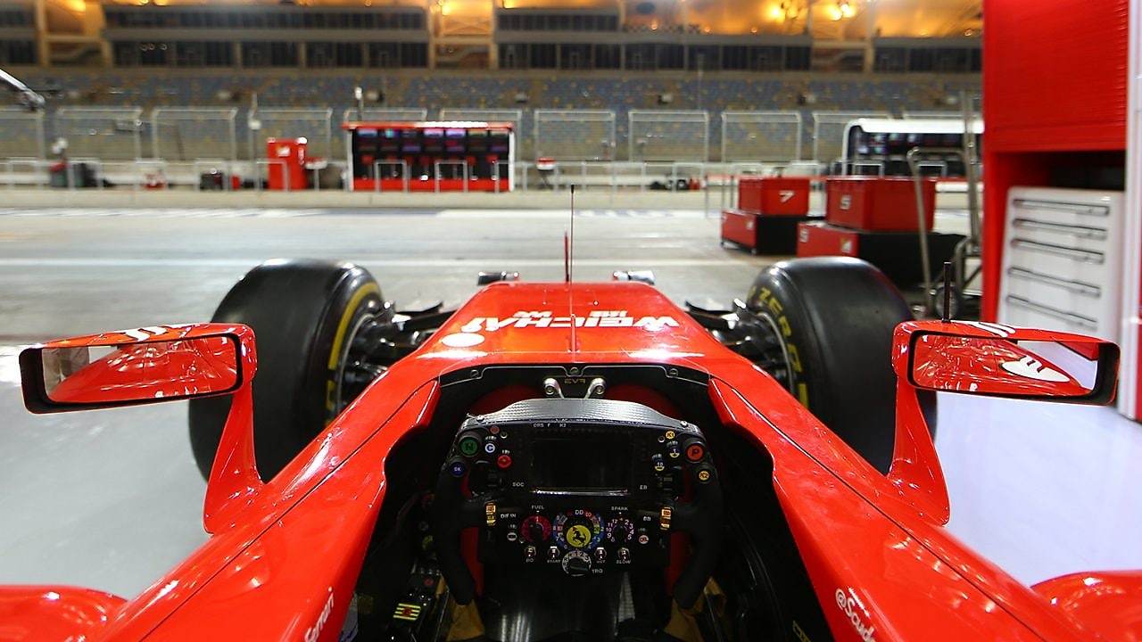 Scuderia Ferrari F1 car in garage
