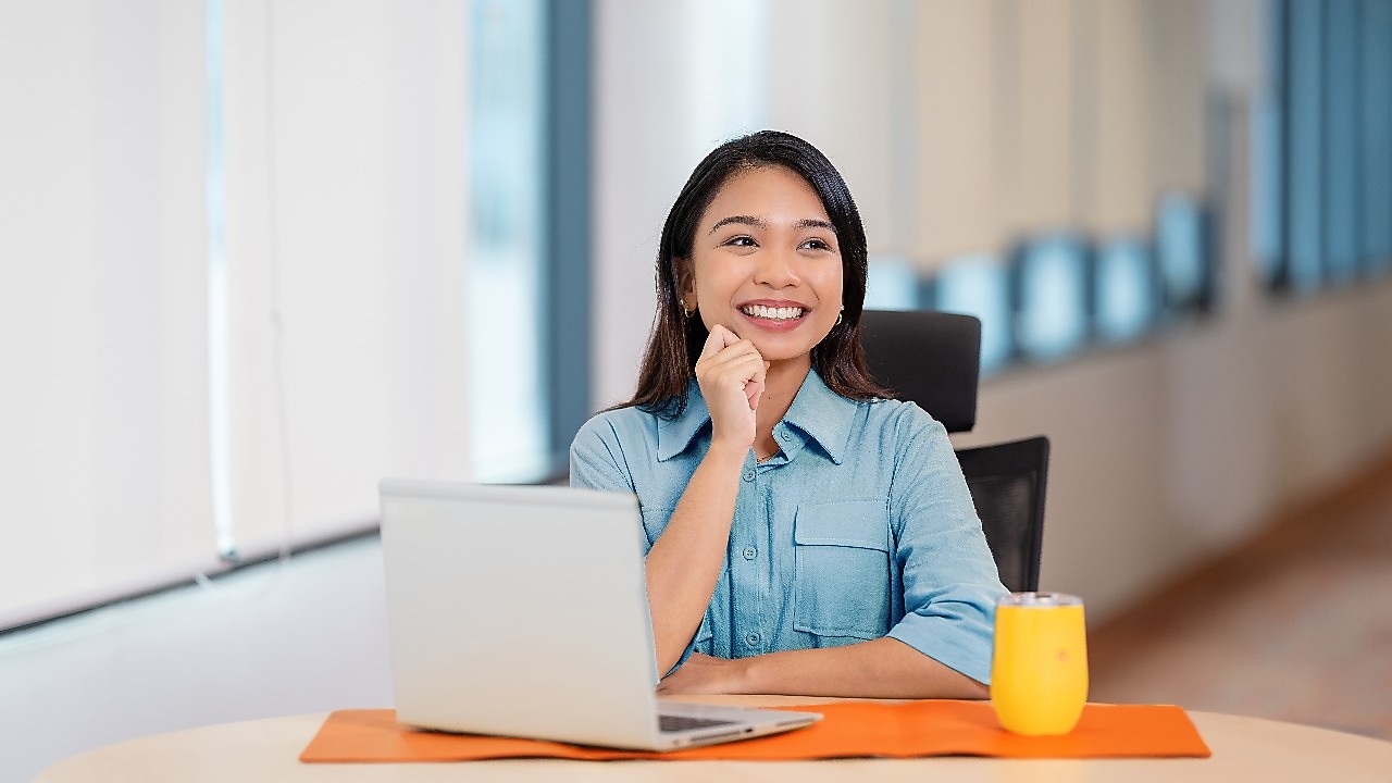 an female employee sitting at a table