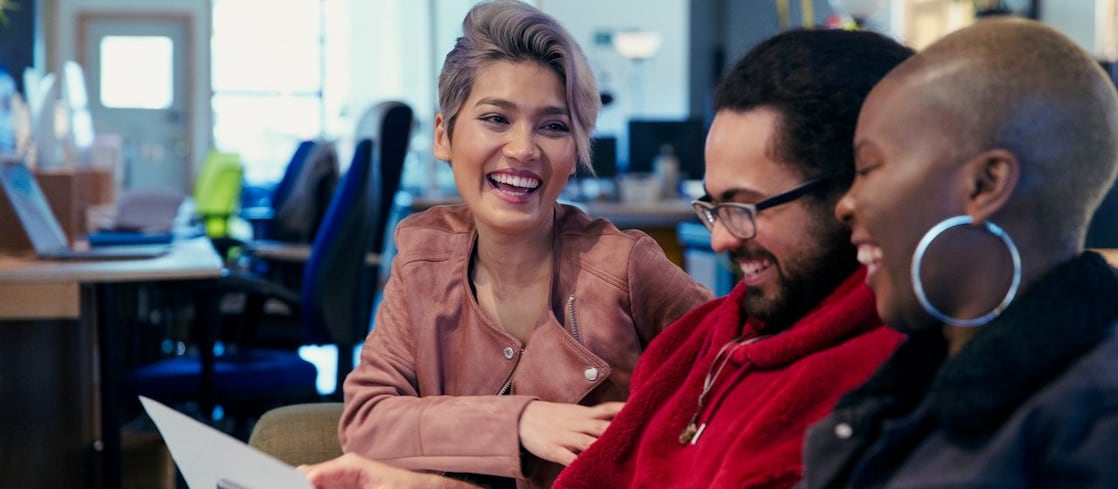 employees posing for a photo