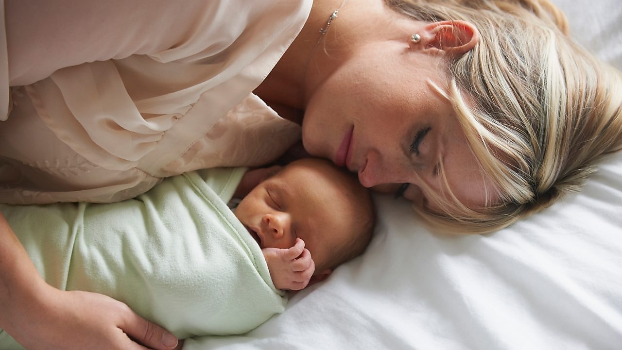 Mum and baby sleeping