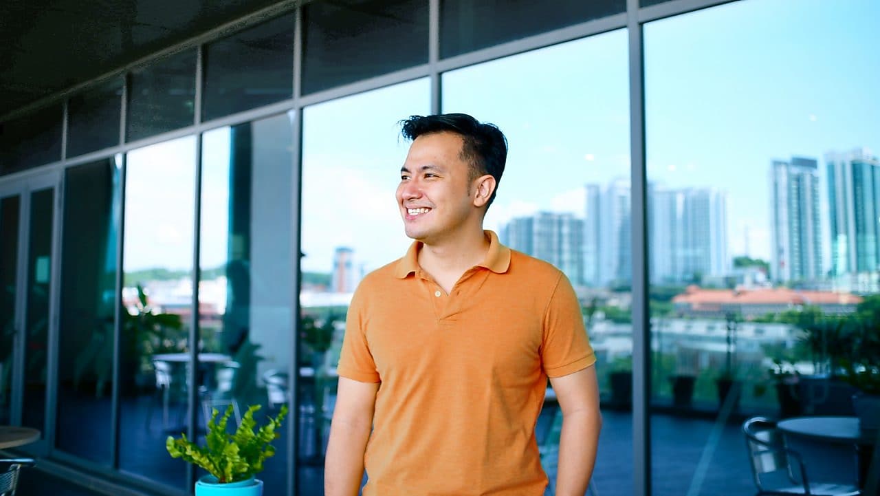 Gordon looking far away and smiling.