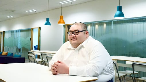 Bryan taking a break at the pantry at office.