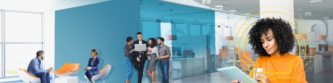 A woman buying online with her card through her I pad while  at work.