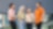a group of employees are standing and having a casual chat
