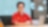Toh Sze smiling while seated with her laptop in front of her.