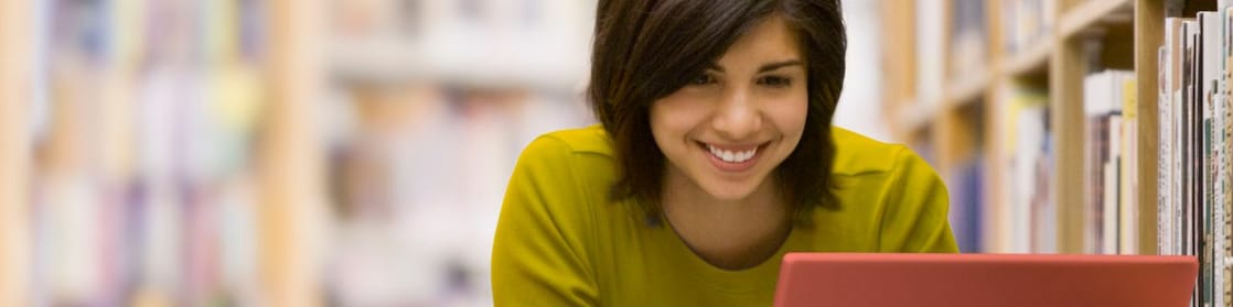 Woman looking at her laptop screen