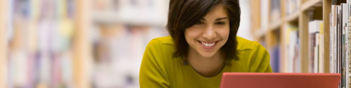 Woman looking at her laptop screen