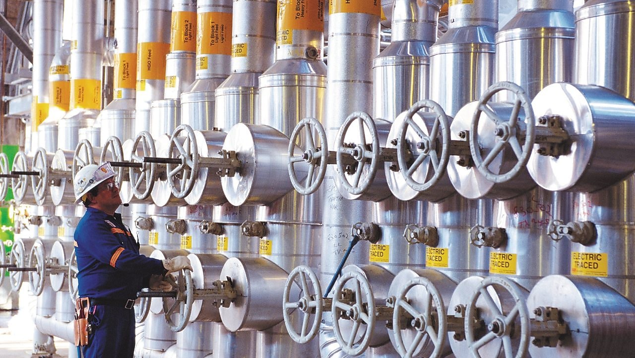 Engineer working on the Feed Header of the OP-2 ethylene plant, Deer Park,2004