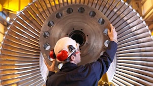 Discipline engineer moving a heavy machine hub
