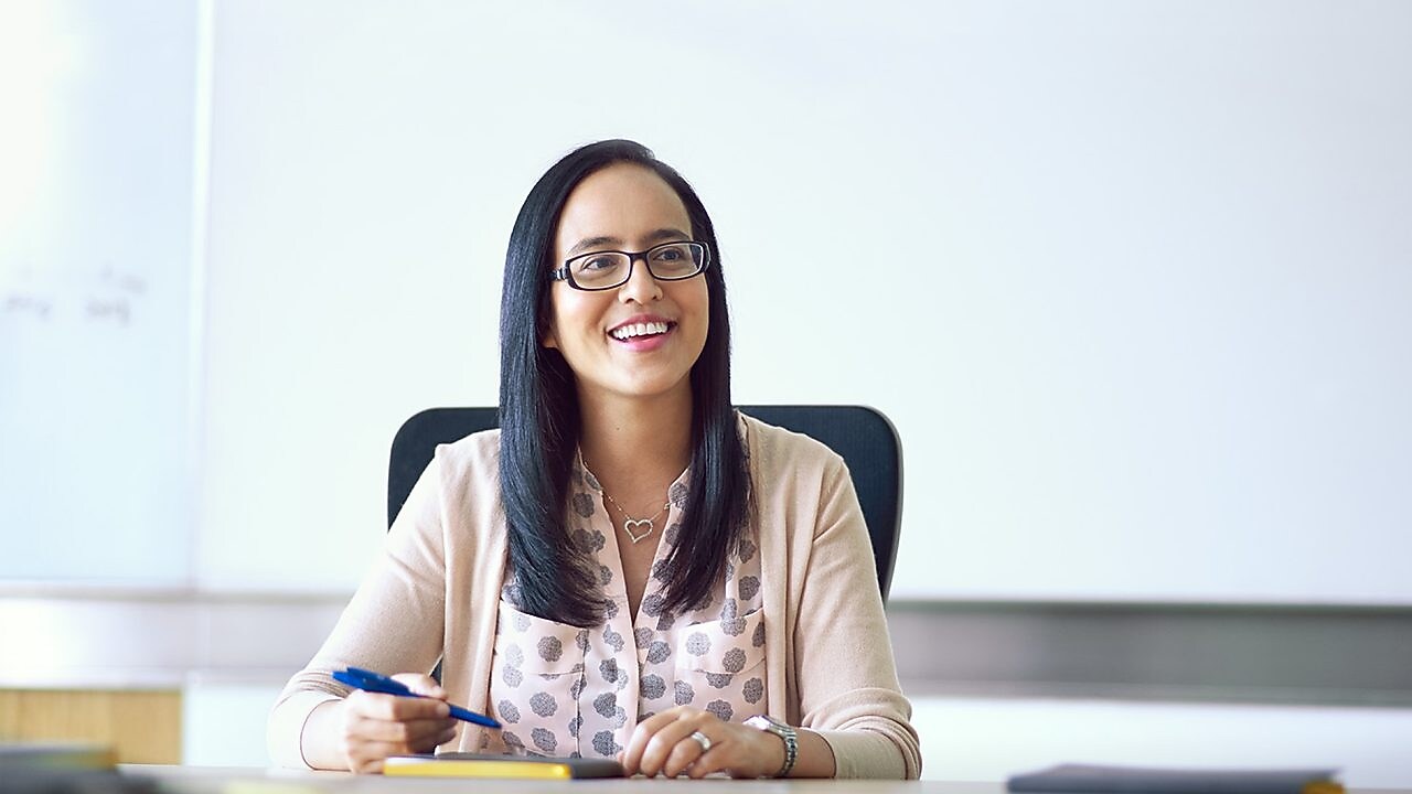 Fazilah at her desk