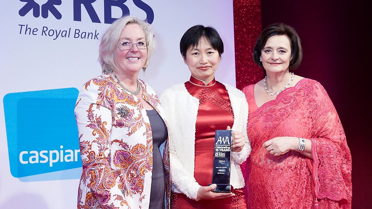 Yee Yee, receiving an award