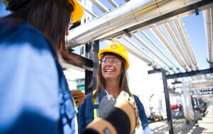 Female colleagues on site talking and smiling