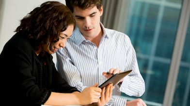 two people discussing how to apply for a job at Shell