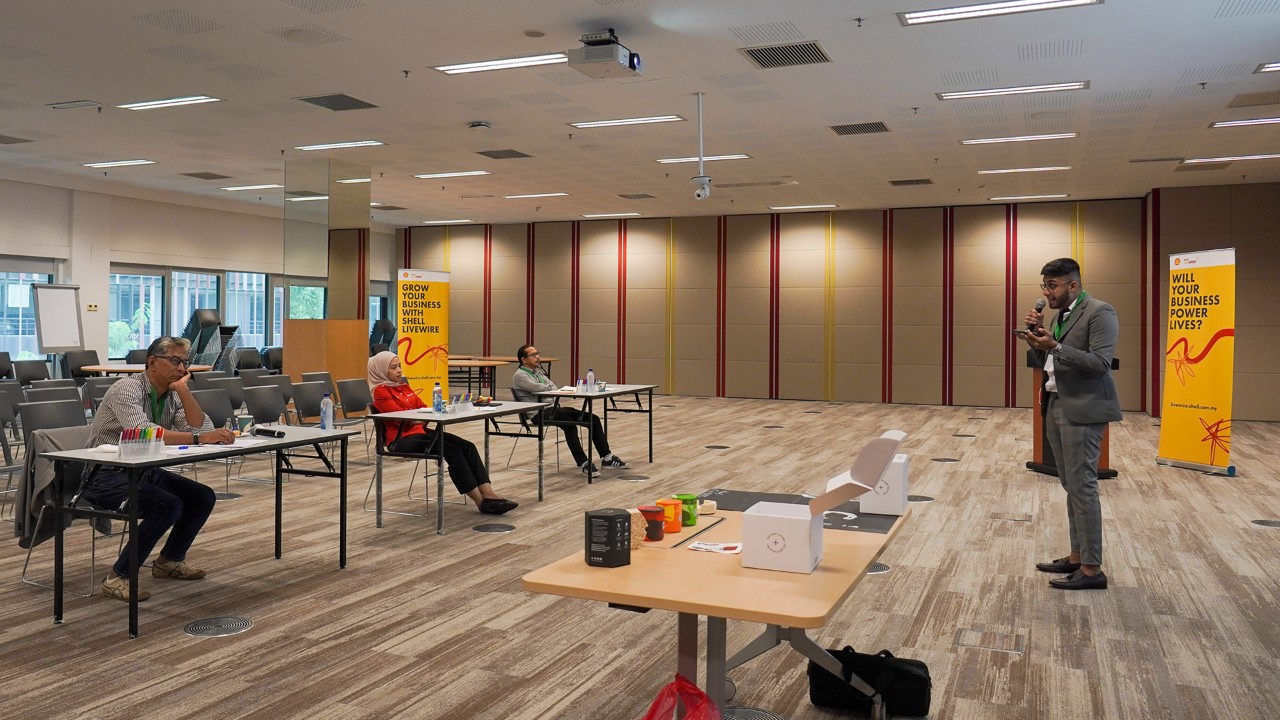 One of the winners presenting to the judges