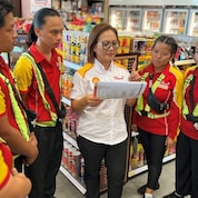 Juliana briefing her staff