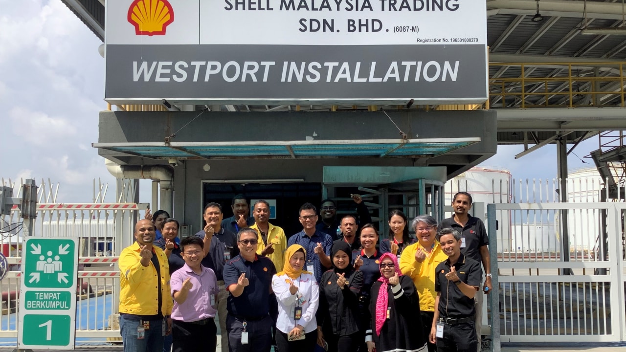Faridah (fourth from left, front row) with her team at Shell-s terminal in Westport.