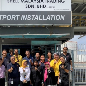 Faridah (fourth from left, front row) with her team at Shell-s terminal in Westport.