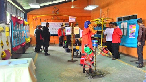 People looking at a safety exhibition