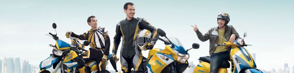 Three men with Shell Advance motorcycles