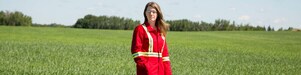 An employee stands in a field near a Quest C02 injection well northeast of Edmonton, Alberta in Canada