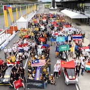 Family photo of some of the participating teams during day two of Shell Make the Future Live Malaysia 2019 at the Sepang International Circuit 