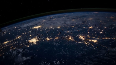 Aerial view of the earth showing city lights City lights of the Southern United States.