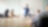 Blue shirt man presenting and pointing towards board