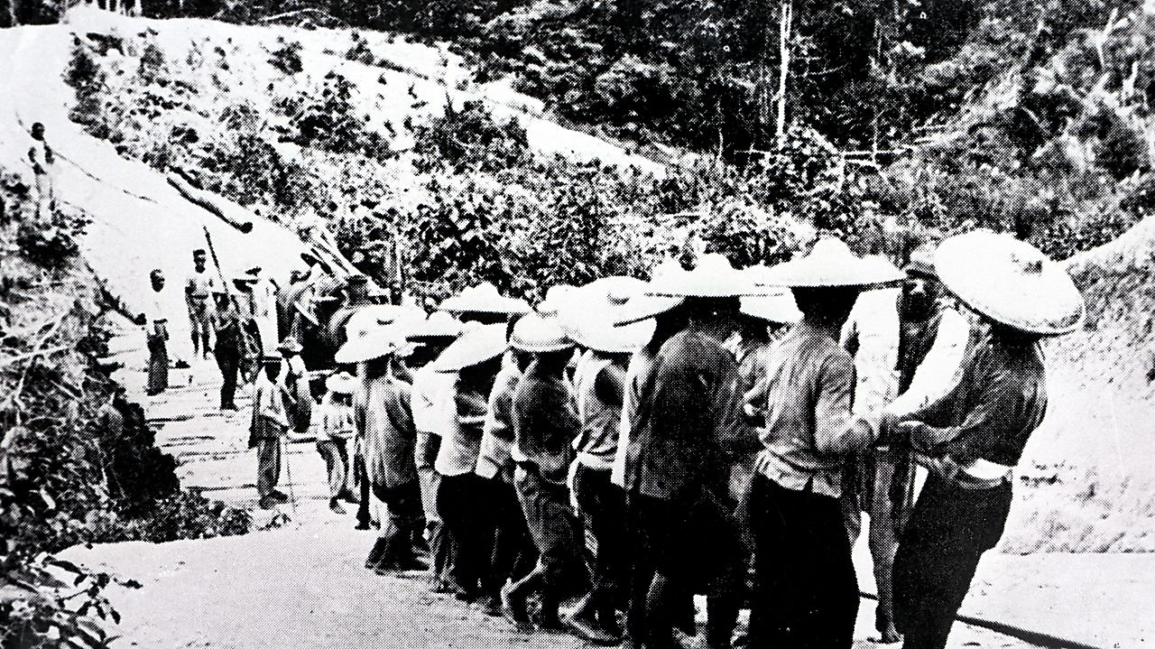 Coolies hauling a boiler uphill, 1911. In the early years, the Company had to rely very much on human power. 
