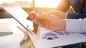 office worker reviewing on tablet