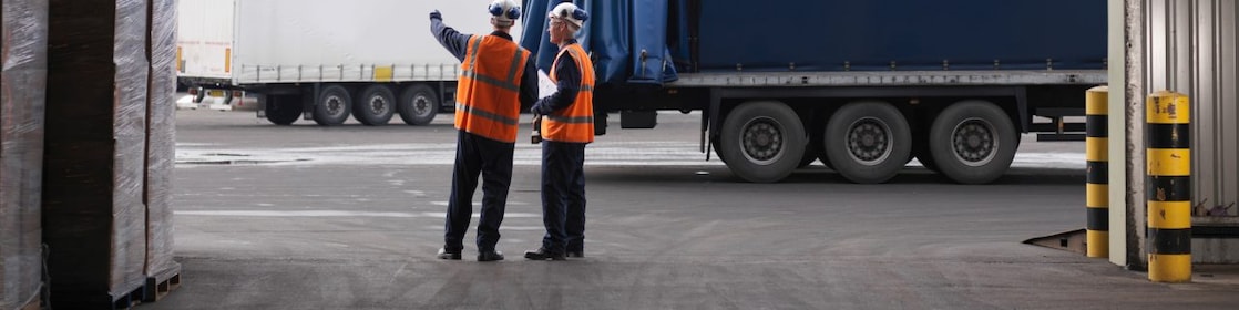 workers standing near trucks