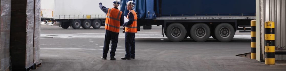 workers standing near trucks