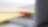 Photo of red pan on yellow piece of paper, placed on the keyboard of a laptop
