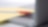 Photo of red pan on yellow piece of paper, placed on the keyboard of a laptop