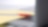 Photo of red pan on yellow piece of paper, placed on the keyboard of a laptop