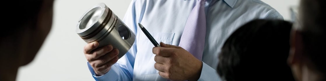 man presenting at a meeting