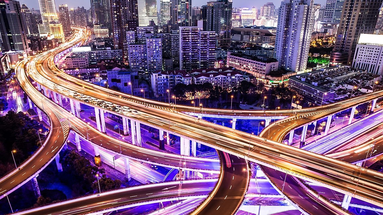 City at night with road lit up