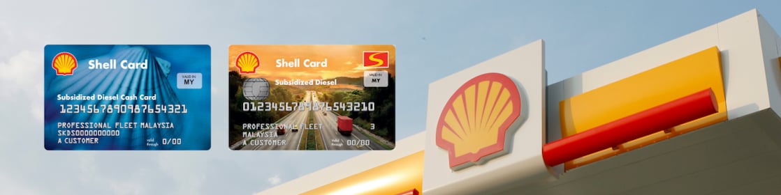  Shell pecten on shell station with Shell card held up in the foreground