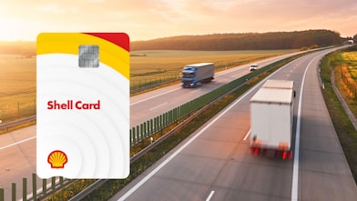 A truck and van on the highway with the Shell Card held up in the foreground