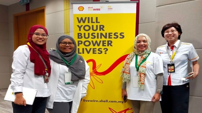 Mimi and Nazrin pose for a photo with us