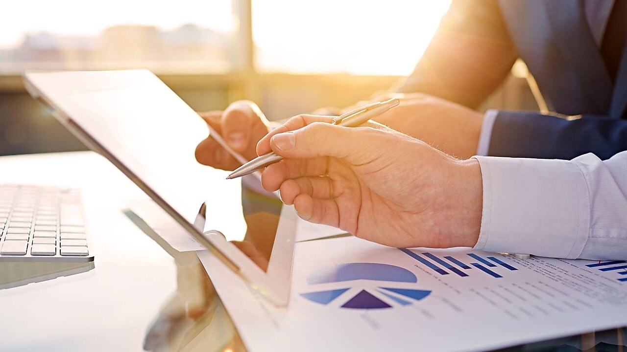 office worker reviewing on tablet