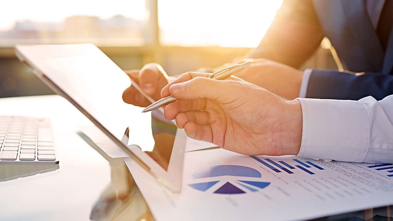 office worker reviewing on tablet