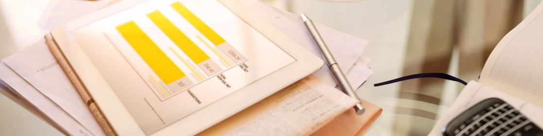 tablet and notes on a desk