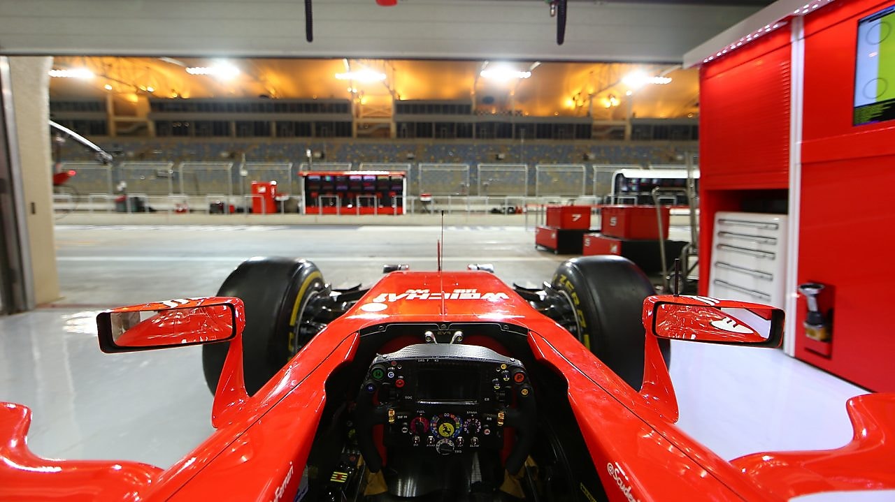 Scuderia Ferrari F1 car in garage