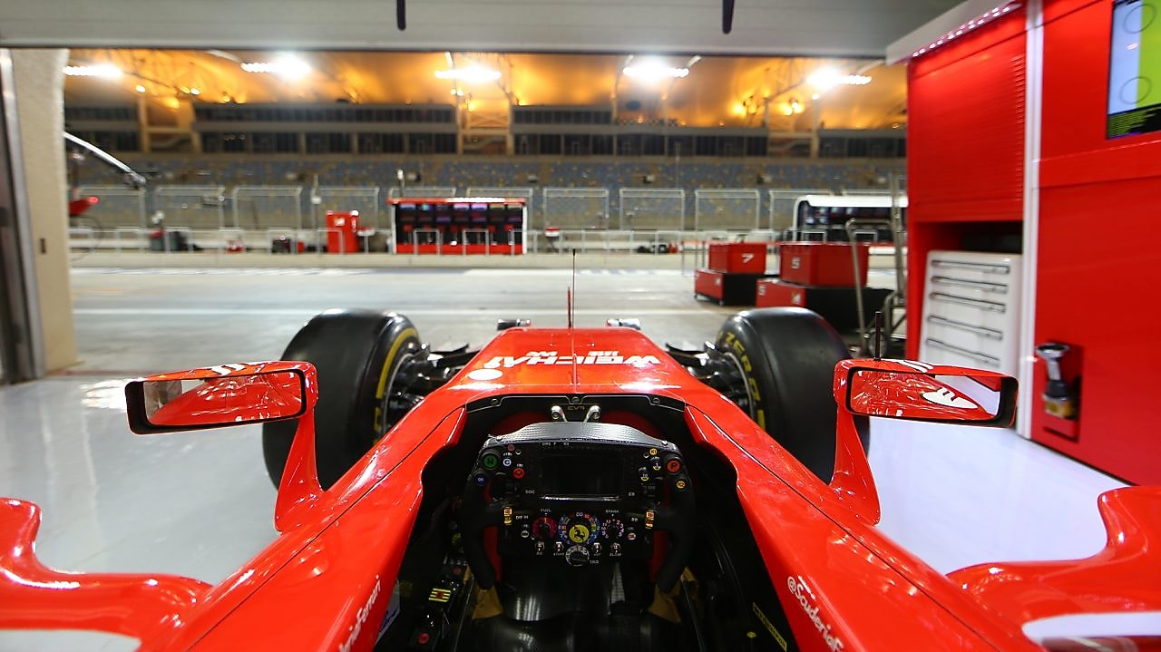 Scuderia Ferrari F1 car in garage