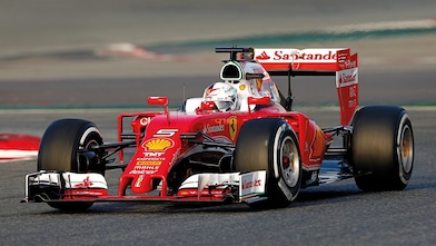 A red Scuderia Ferrari sits on a racing track, an example of Shell Helix Ultra’s Innovation Partnership