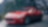 A red Maserati with standard Shell Helix Ultra product proudly sits on a scenic mountain road