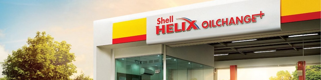shell helix oil change plus with red car