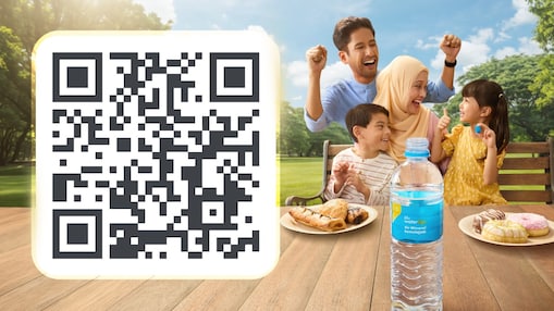 A family joyfully enjoys a picnic at a park,  featuring pastries and a Shell Select  water2go water bottle on the table. A large  QR code is prominent on the left side.
